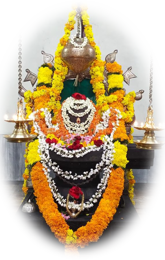 Sri Nagesh-Baneshwar temple deity adorned for worship